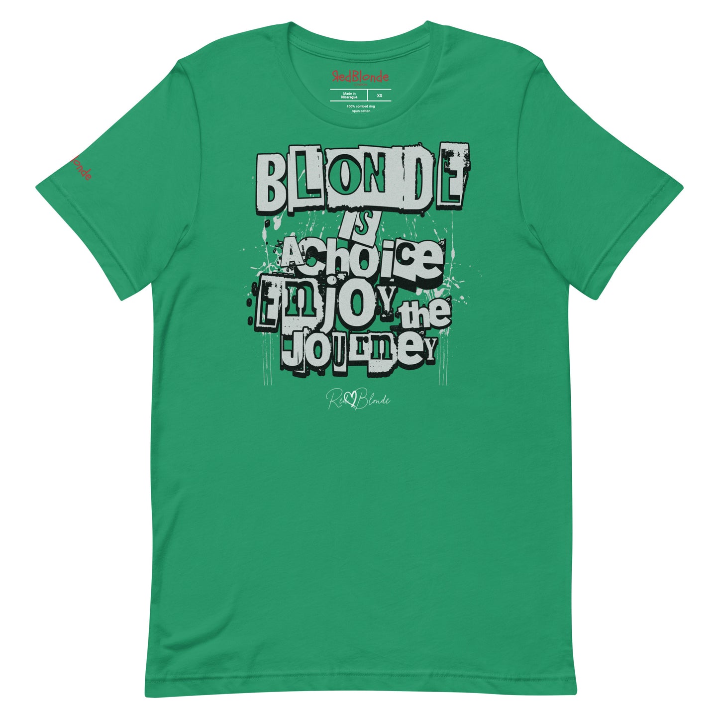 A kelly green unisex T-shirt with a classic crew neckline and short sleeves. The front displays a bold, graffiti-style text design in black, white, and gray. The words read: “BLONDE is a choice, ENJOY the JOURNEY” with varied fonts and a layered street-art effect. The RedBlonde brand name is subtly printed below in a handwritten script. Branded RedBlonde london in red on inside neck and right sleeve