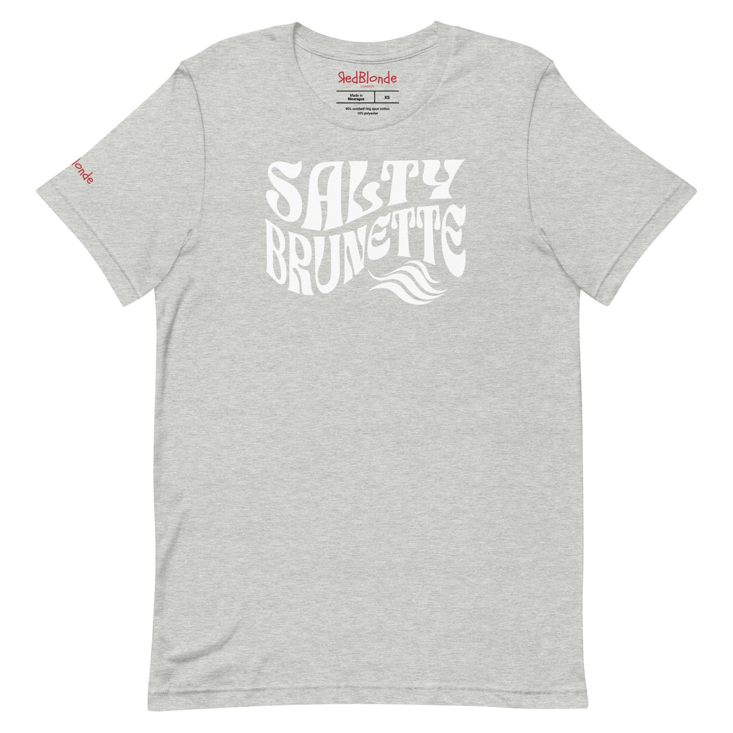 flatlay of light gray classic unisex graphic t-shirt with the slogan 'Salty Brunette' in Solino Display white retro 70s wavy font. Branded RedBlonde in red on inside neck and right sleeve
