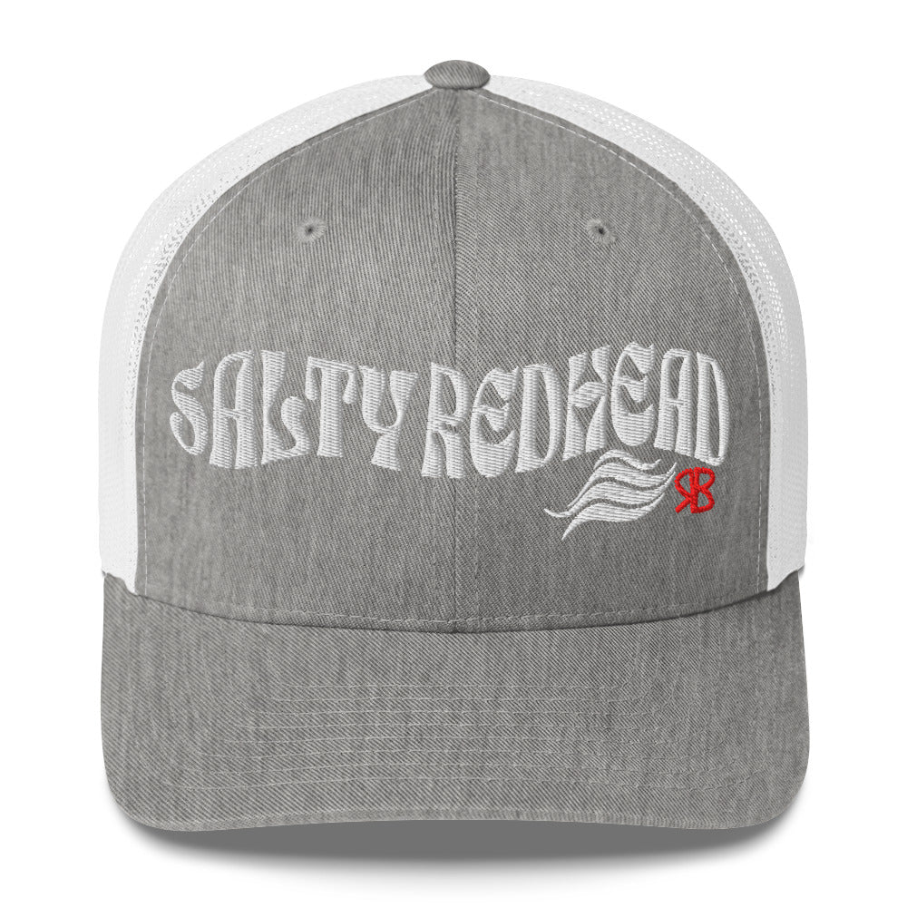 light gray / white trucker cap with 'Salty Redhead' in white Solino display font. Branded RB in red