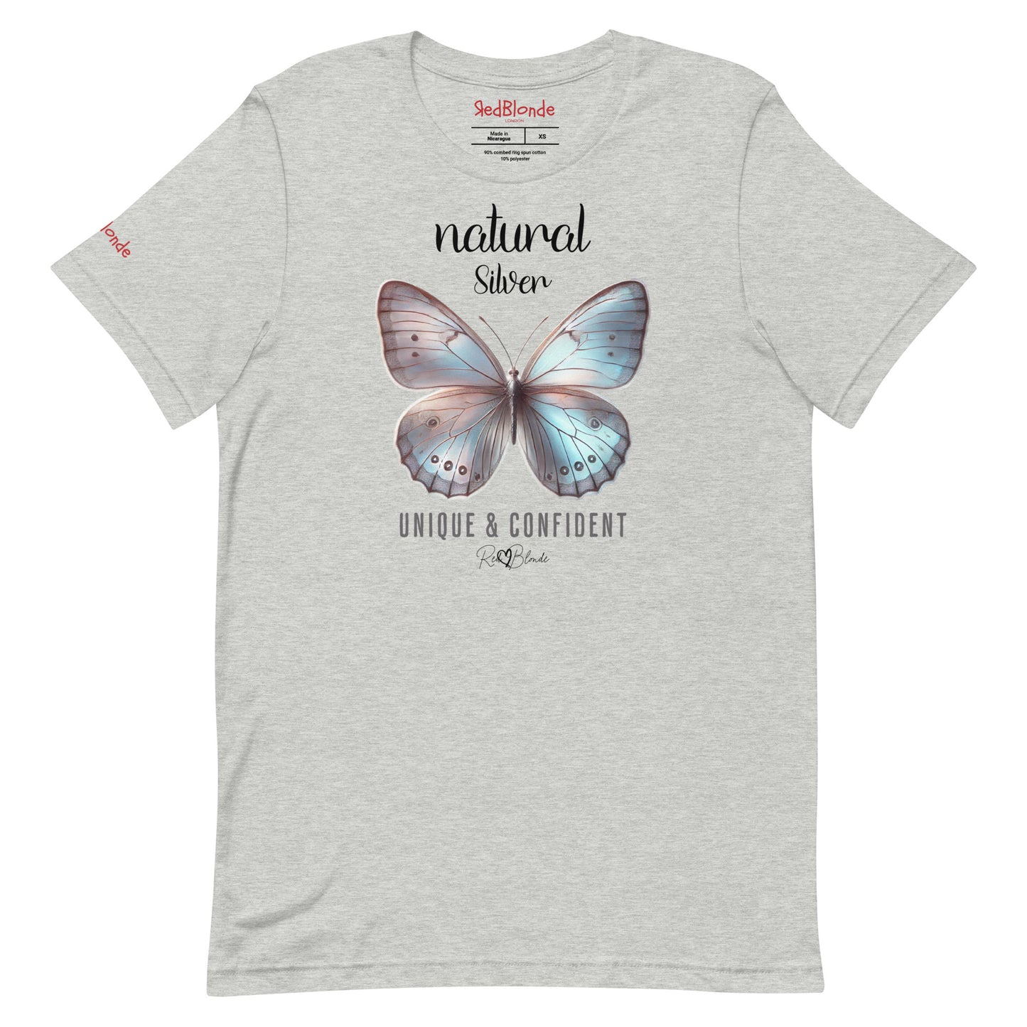 Flatylay of a light grey unisex relaxed fit t-shirt with the words natural Silver in arionna font above a graphic of a silver butterfly with 'UNIQUE & CONFIDENT' below in adventurer 06 font signed off by RedBlonde. Branded RedBlonde London on inside neck and right sleeve