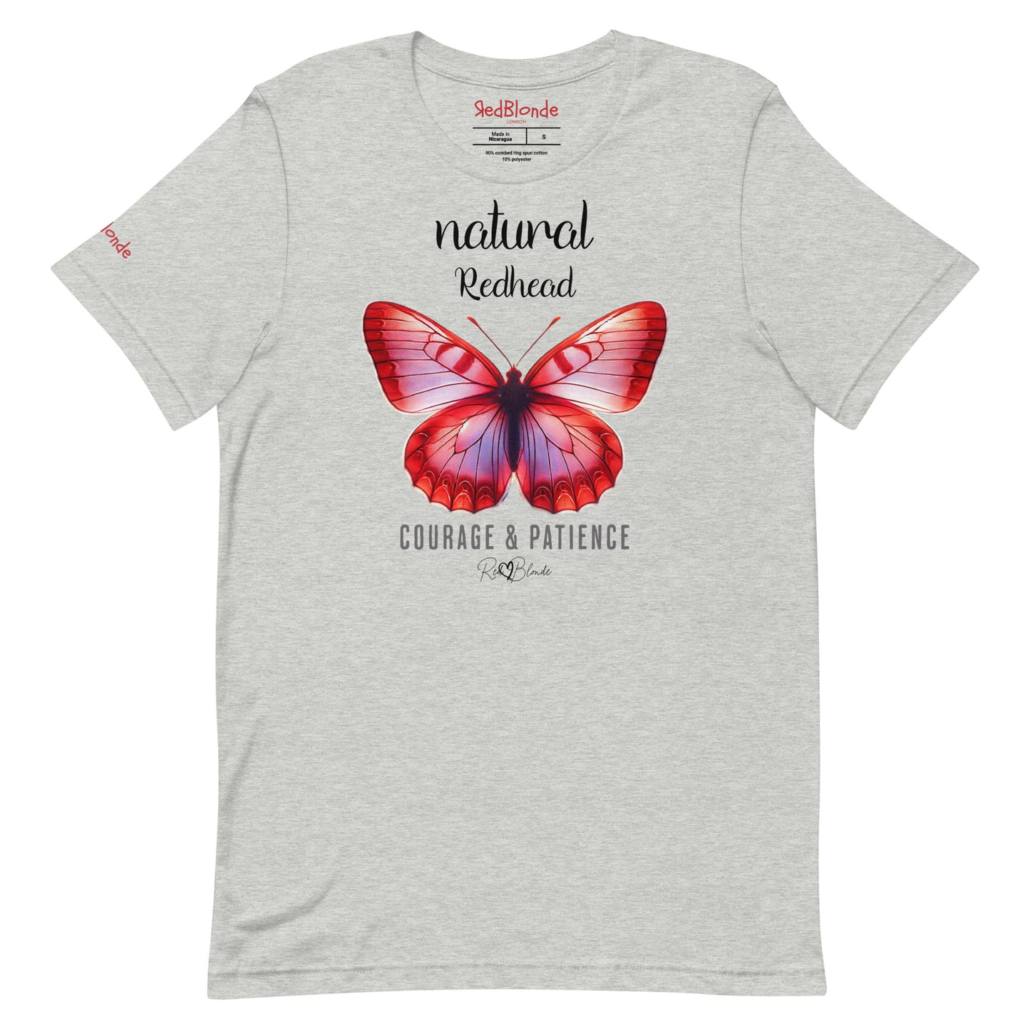Flatlay of light grey unisex relaxed fit t-shirt with the words natural redhead in arionna font above a graphic of a red butterfly with 'COURAGE & PATIENCE' below in adventurer 06 font signed off by RedBlonde. Branded RedBlonde London on inside neck and right sleeve