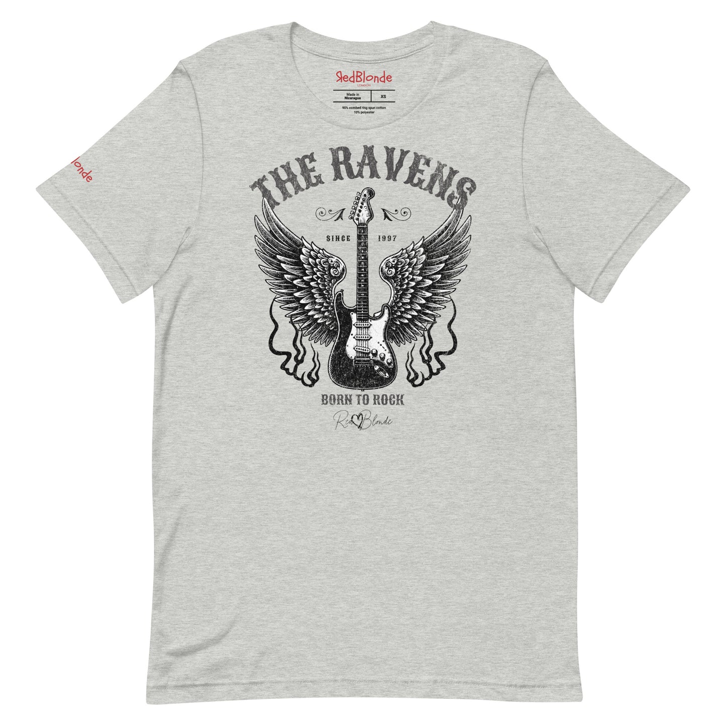 A flatlay of a light grey unisex t-shirt with a graphic of a black & white guitar with raven bird wings emerging from the side. The graphic features ‘THE RAVENS’ in Sancreek font in a semicircle above the guitar, while ‘BORN TO ROCK’ is underneath. Branded RedBlonde London in inside neck and right sleeve