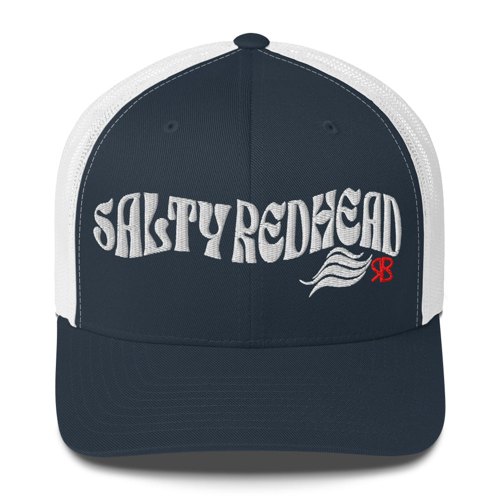 navy/white trucker cap with 'Salty Redhead' in white Solino display font. Branded RB in red