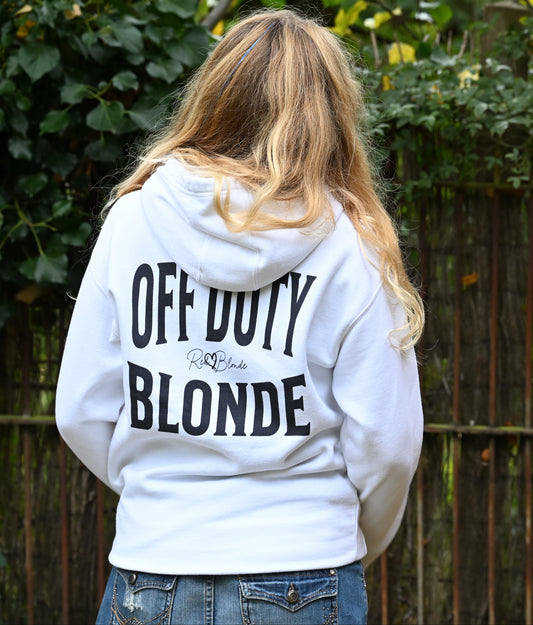 Blonde wears a classic black unisex hoodie with the words 'OFF DUTY BLONDE' written in large Brookfield white font, across the back. Branded RedBlonde London in red on inside neck and right sleeve