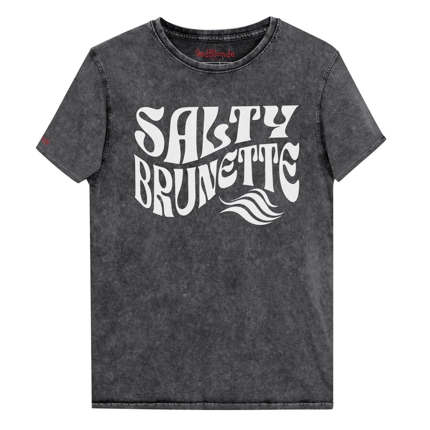 flatlay of soft black denim wash vintage graphic t-shirt with the slogan 'Salty Brunette' in white retro 70s font. Branded RedBlonde in inside neck and right sleeve