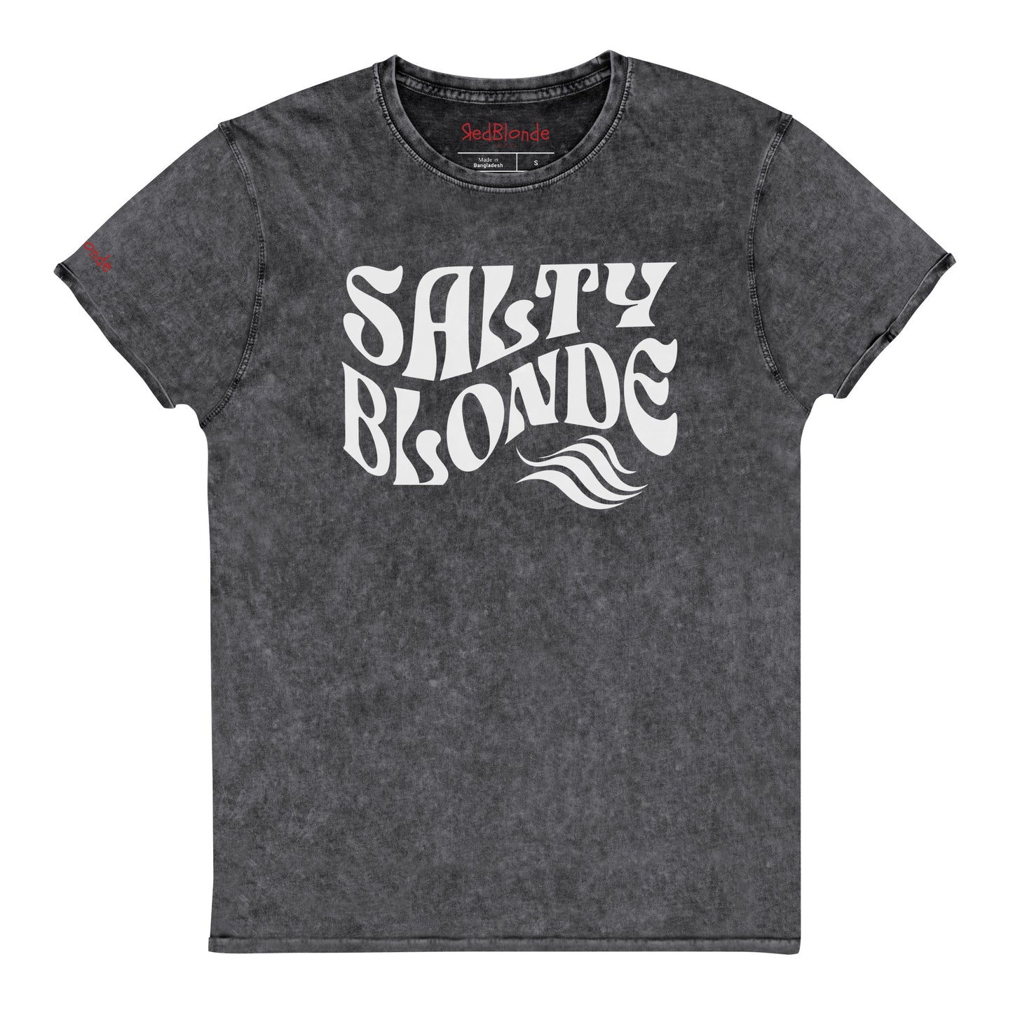 flatlay of soft dark grey denim vintage wash graphic t-shirt with the slogan 'Salty Blonde' in white retro 70s wavy font. Branded RedBlonde inside neck and right shoulder in red
