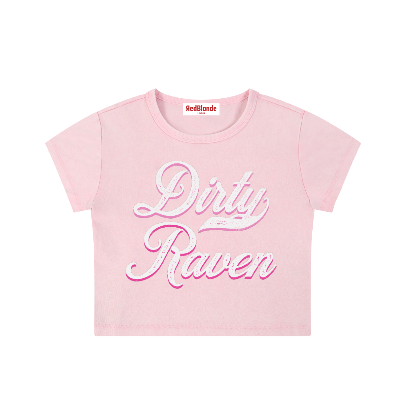 Light pink short-sleeve crop T-shirt with large cursive “Dirty Raven” Milkstore text in white and pink on the front, and a small “RedBlonde London” label at the neckline.