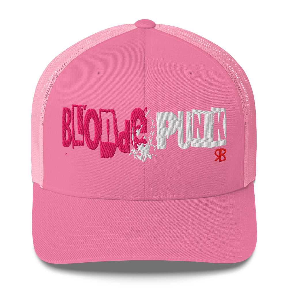 pink trucker cap with 'Blonde Punk' in irregular printing block style caps and lowercase. Blonde is written in bright pink and Punk in black lettering. Branded RB in red