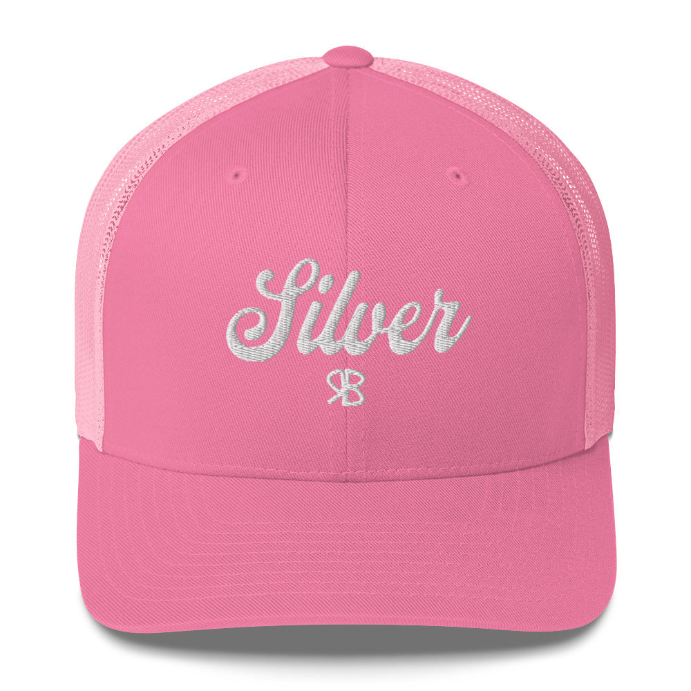 pink trucker cap with 'Silver' in white adventurer 01 font on front. Mesh back. Branded RB
