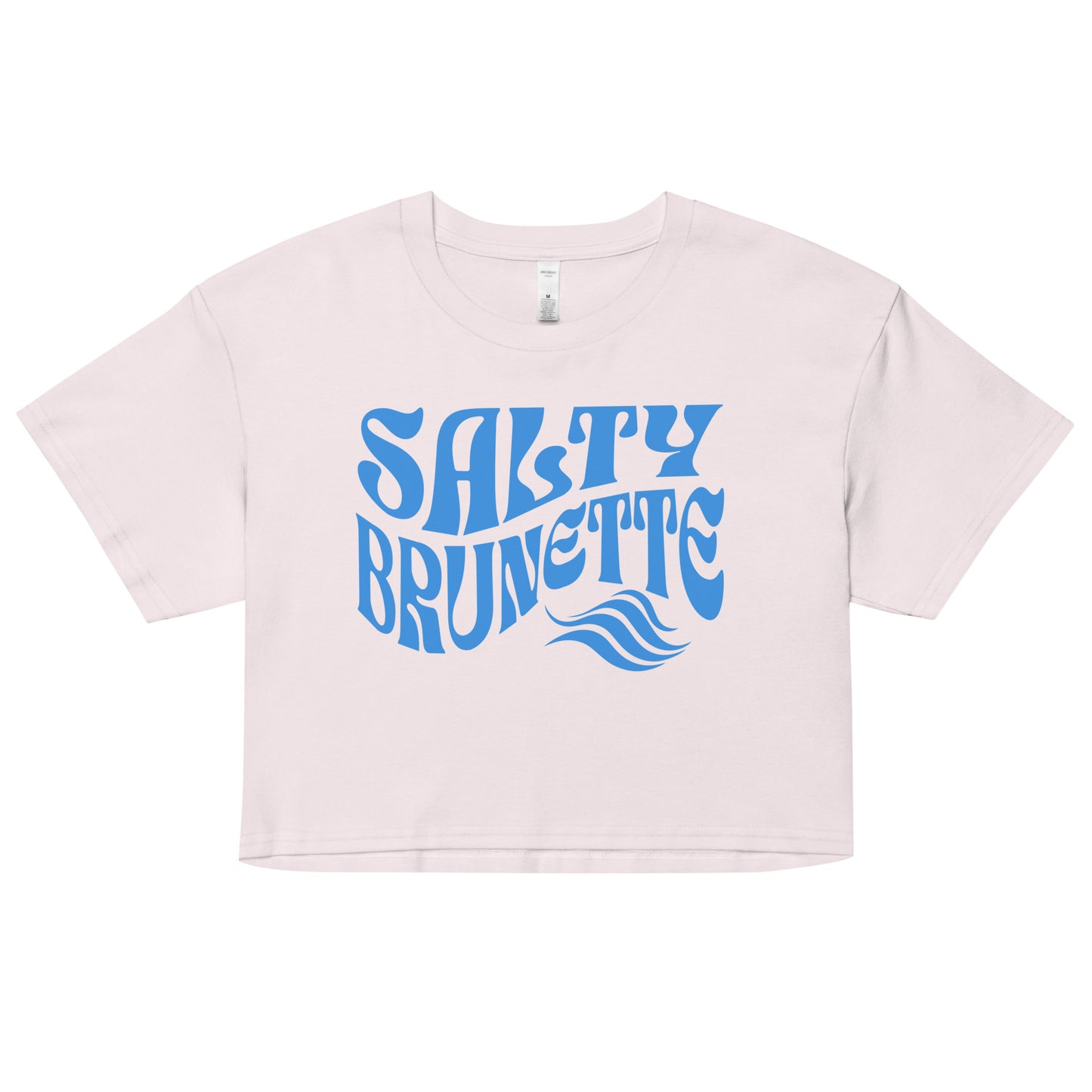Flatlay of a orchid loose women's crop top t-shirt with the words ‘Salty Brunette' in blue retro 70s font