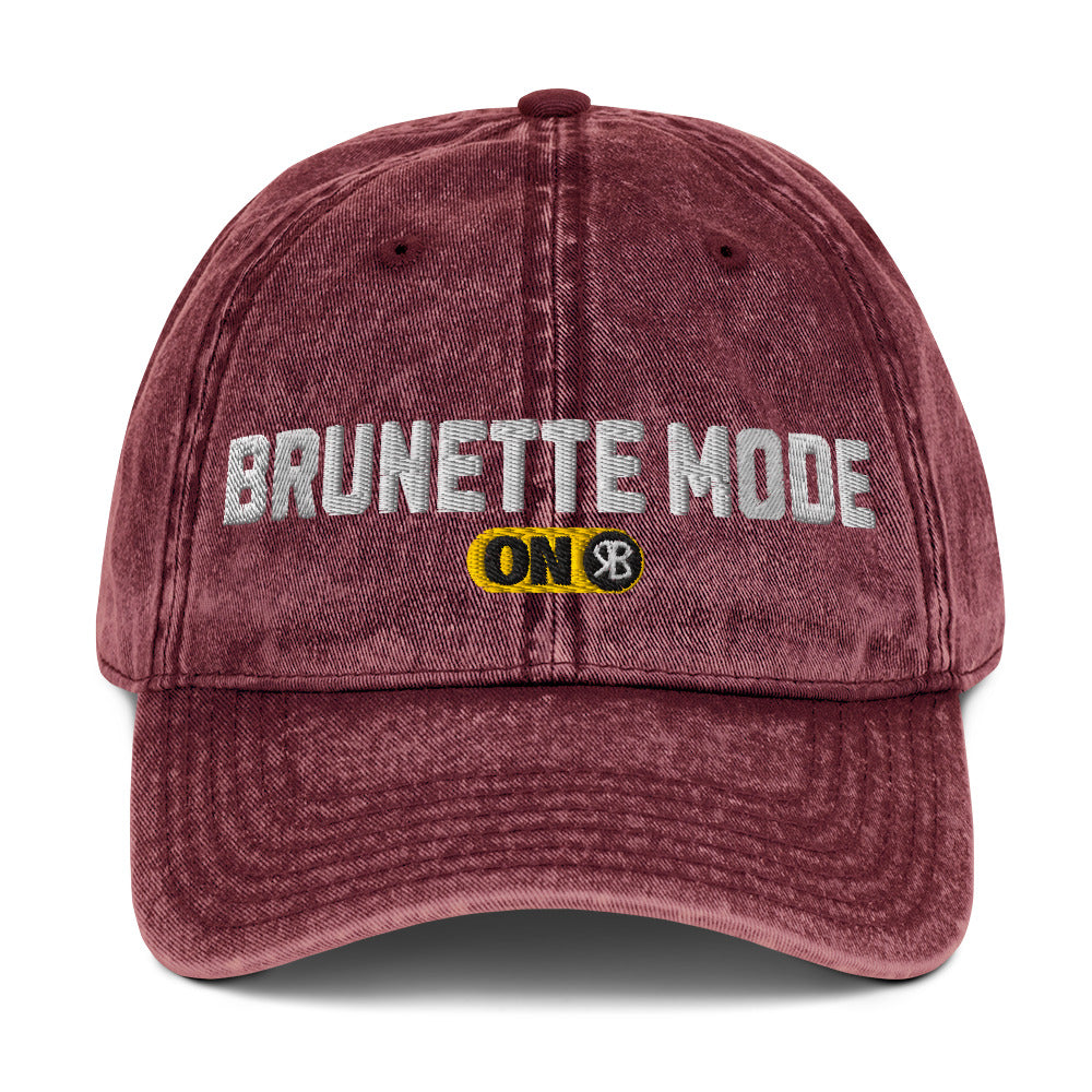 red denim cap with 'Brunette Mode ON' embroidered in white Univercity font with RB logo