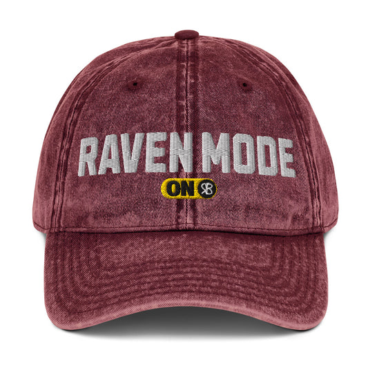 red denim cap with 'Raven Mode ON' embroidered in white Univercity font with RB logo