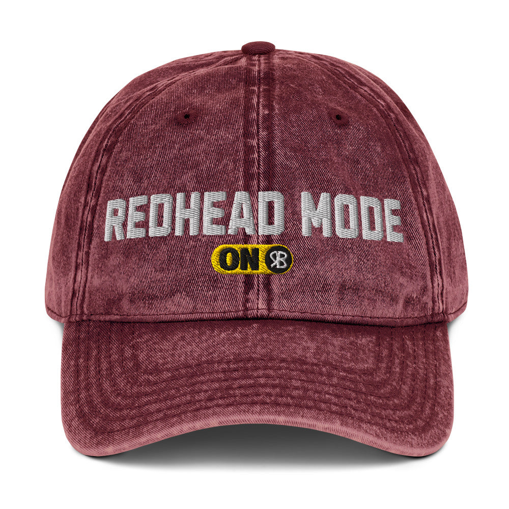 red denim cap with 'Redhead Mode ON' embroidered in white Univercity font with RB logo