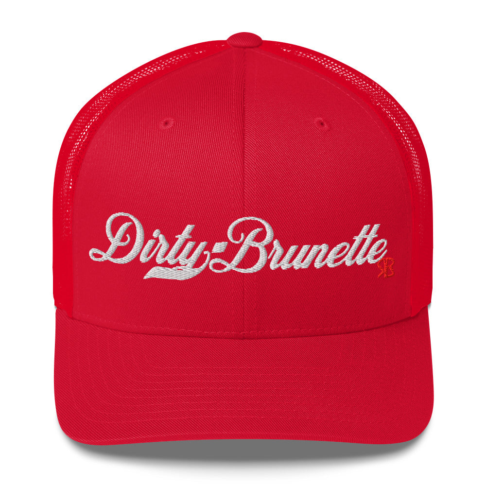 red trucker cap with 'Dirty Brunette' in white milkstore font. Branded RB in Red