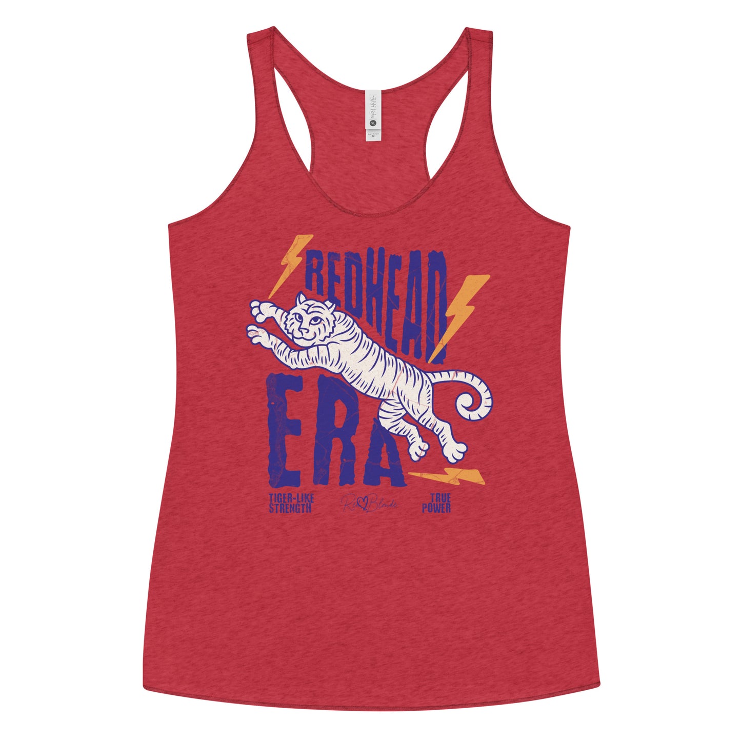 red vintage-style racerback tank features a large, stylized illustration of a tiger leaping forward in pale purple and white. Bold, distressed text above and below reads “REDHEAD ERA” in uppercase purple letters, with two orange lightning bolts flanking the text. Beneath the lion in small purple letters are the phrases “Tiger-like strength” and “True power.” RedBlonde with a heart small signature-like logo appears below the text.