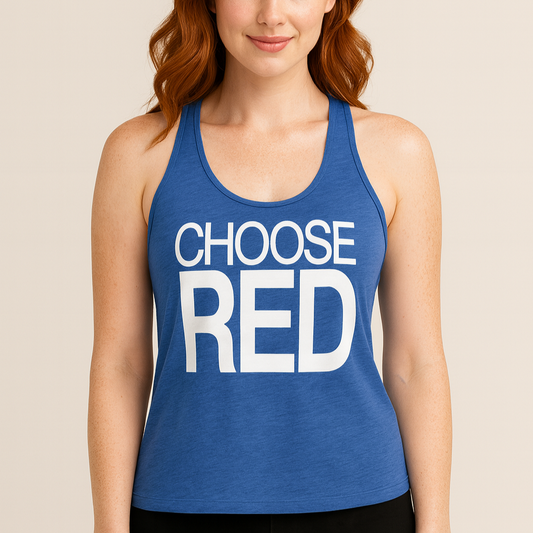redhead wears a blue racerback tank top with “Choose Red” in white Helvetica Now font emblazoned on the front. Branded RedBlonde on back