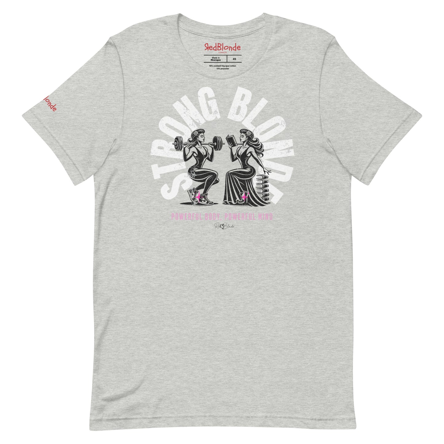 A relaxed-fit crew neck t-shirt in grey, featuring a graphic of two women: one holding a barbell on her shoulders, the other reading a book on a pile of books. The words ‘STRONG BLONDE’ are arced over the women in pale grey, while ‘Powerful Body, Powerful Mind’ is in bright pink underneath. The t-shirt is signed off RedBlonde with a heart. Branded RedBlonde in red on inside neck and right sleeve