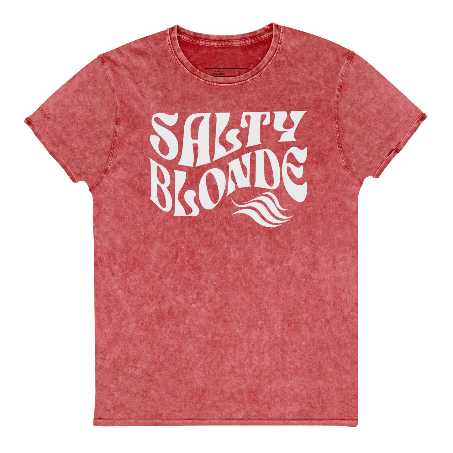flatlay of soft garnet red denim vintage wash graphic t-shirt with the slogan 'Salty Blonde' in white retro 70s wavy font. Branded RedBlonde inside neck and right shoulder in red