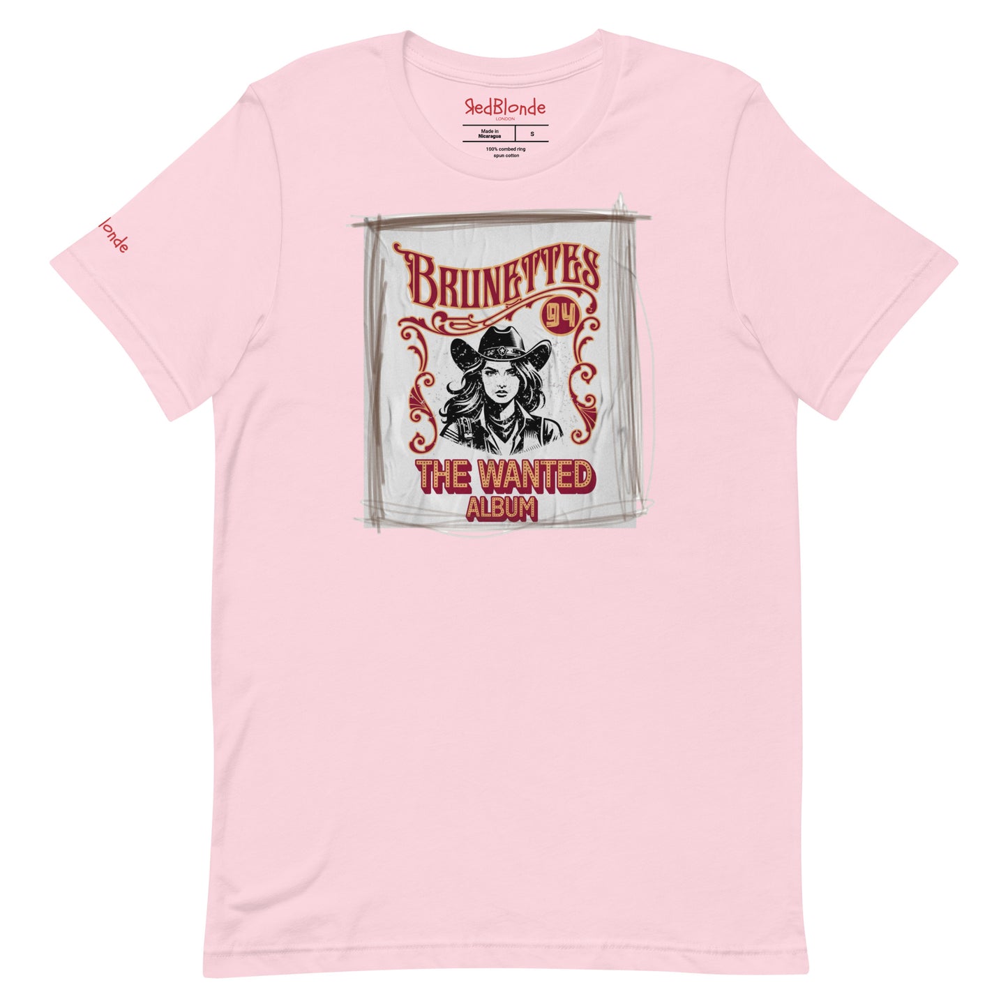 soft pink classic unisex relaxed fit t-shirt with graphic of an album cover featuring a girl in a cowboy hat with the words ' Brunettes'94 - The Wanted Album'. Branded RedBlonde in red on inside neck and right sleeve.