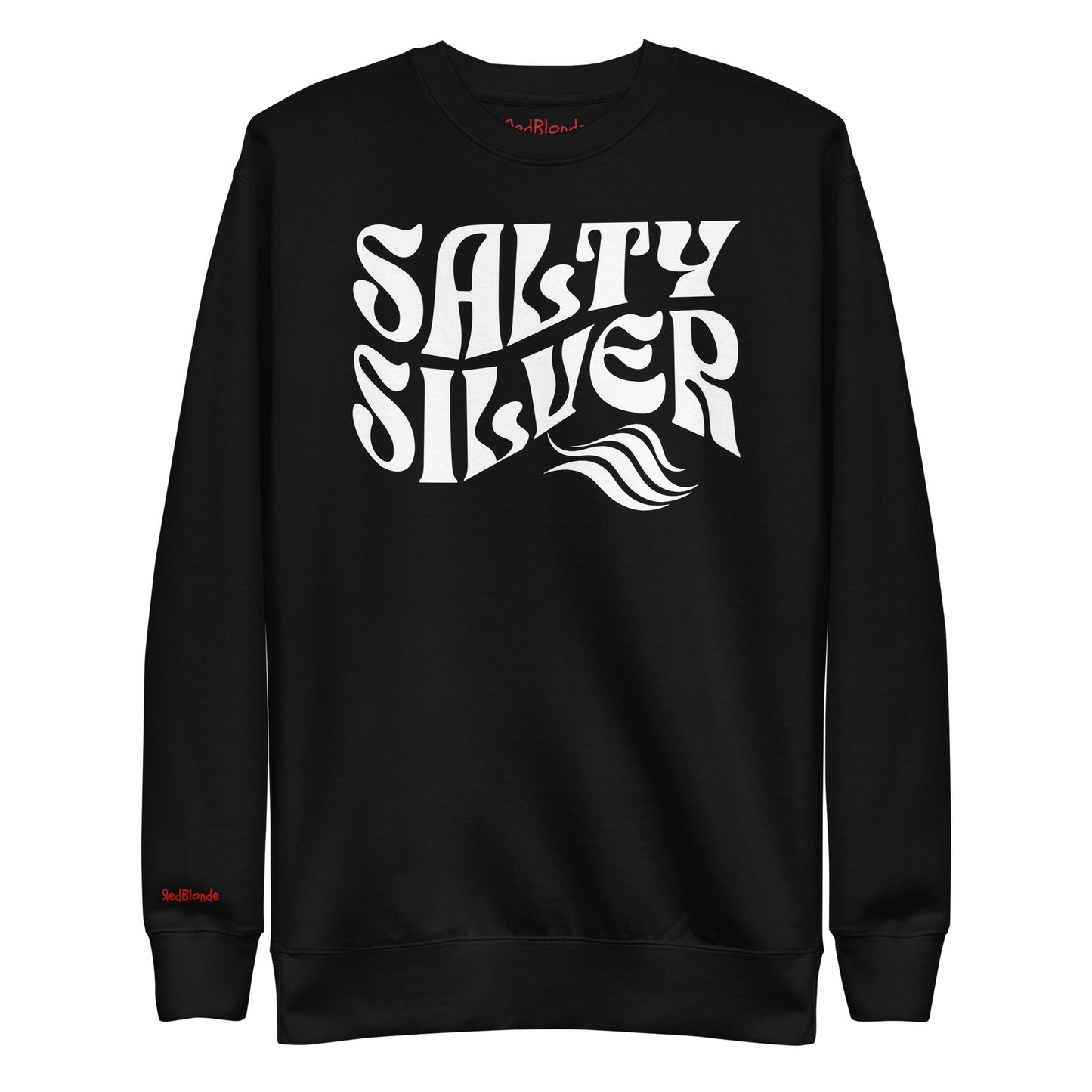 flatlay of Classic relaxed fit unisex sweatshirt in black with 'Salty Silver' play on words slogan in white retro 70s wavy text. Branded RedBlonde on inside neck and right cuff in red