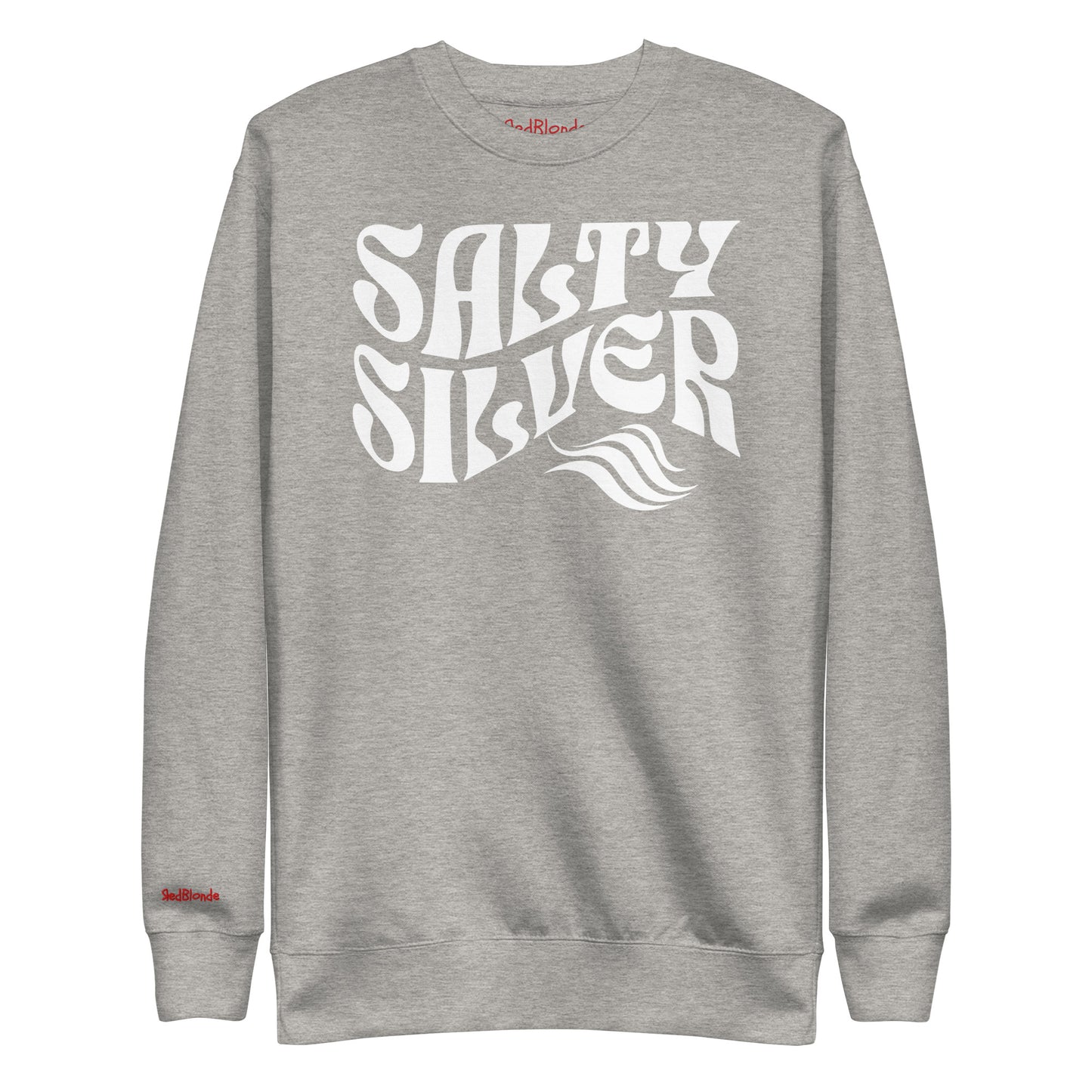 flatlay of Classic relaxed fit unisex sweatshirt in grey with 'Salty Silver' play on words slogan in white retro 70s wavy text. Branded RedBlonde on inside neck and right cuff in red