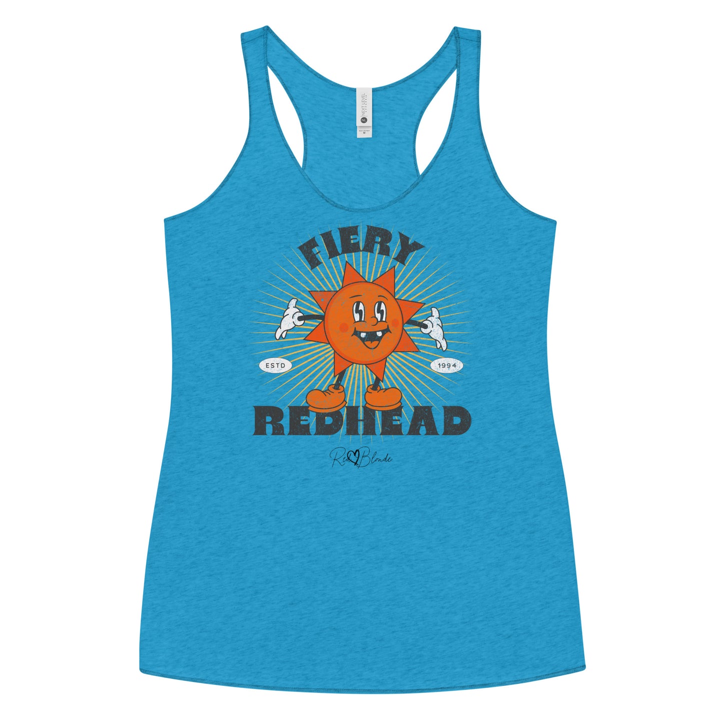 Turquoise blue women’s racerback tank with a bold retro graphic of a smiling orange cartoon sun character, surrounded by radiant sunbeams. The text reads ‘Fiery Redhead’ in distressed black Belzebuth lettering with small details including ‘ESTD 1994’ and the RedBlonde signature logo beneath."