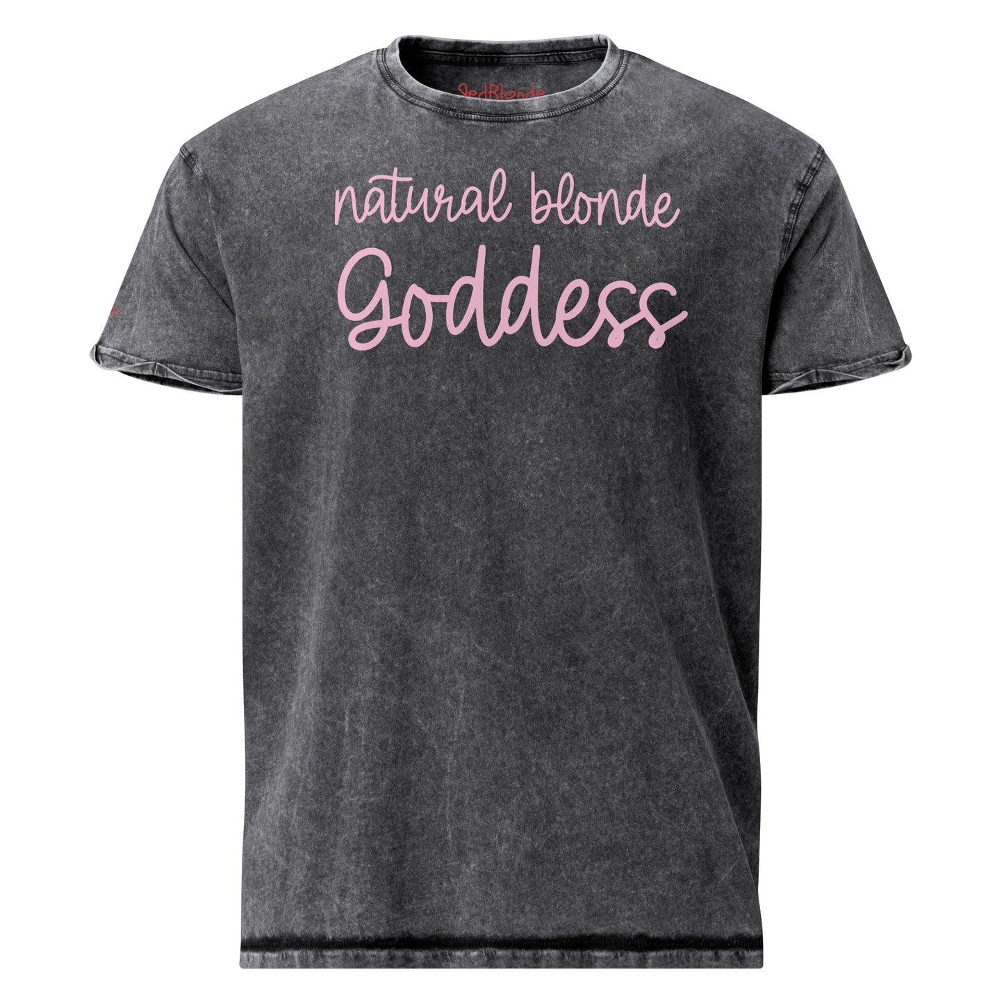Flatlay of a unisex black Vintage denim wash graphic tee with “Natural Blonde Goddess” in handwritten text in pale pink . Branded redblond on right shoulder in red