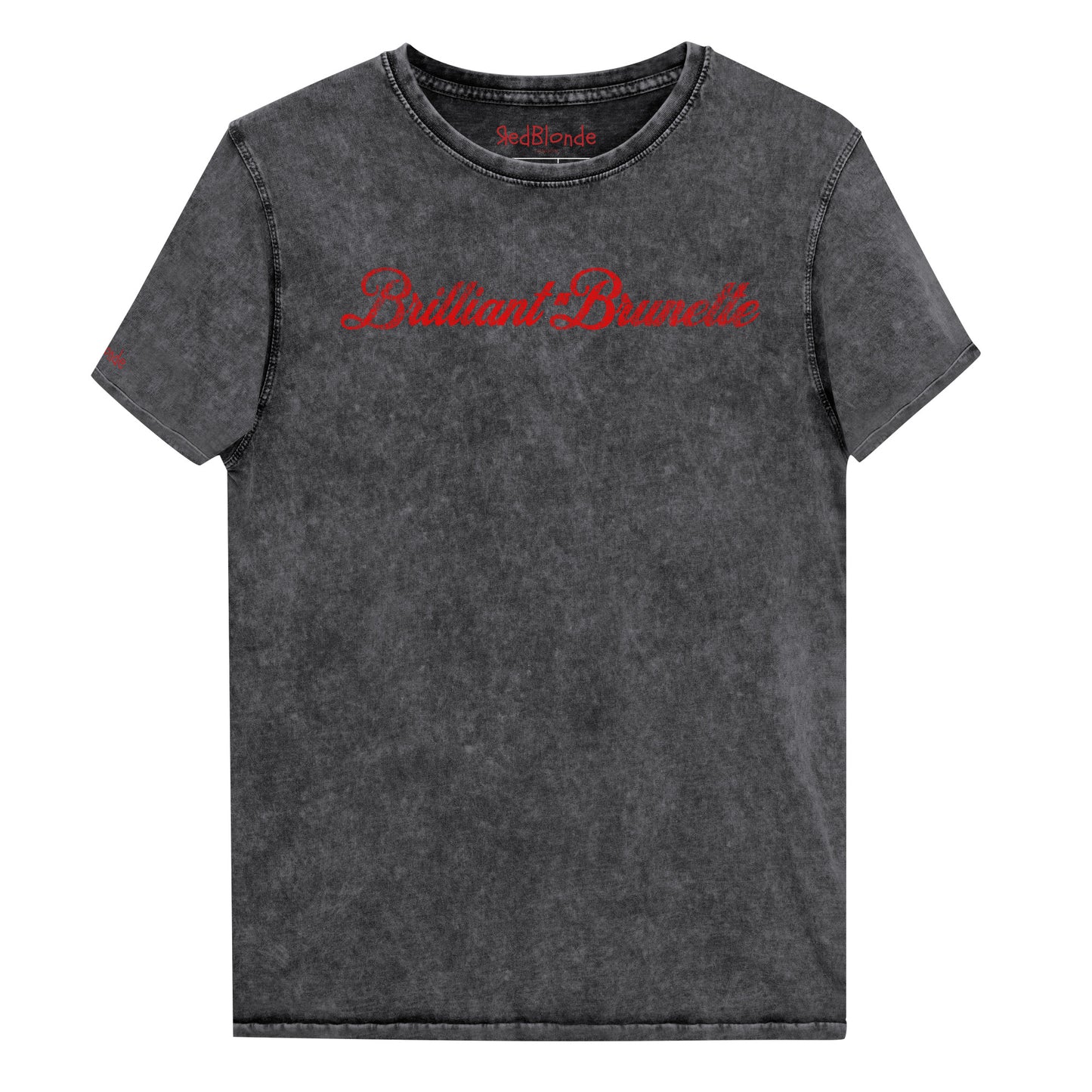 Flatlay of unisex relaxed fit black vintage denim wash slogan t-shirt with 'Brilliant Brunette' in milkshake script red font. Branded RedBlonde in red on inside neck and right sleeve