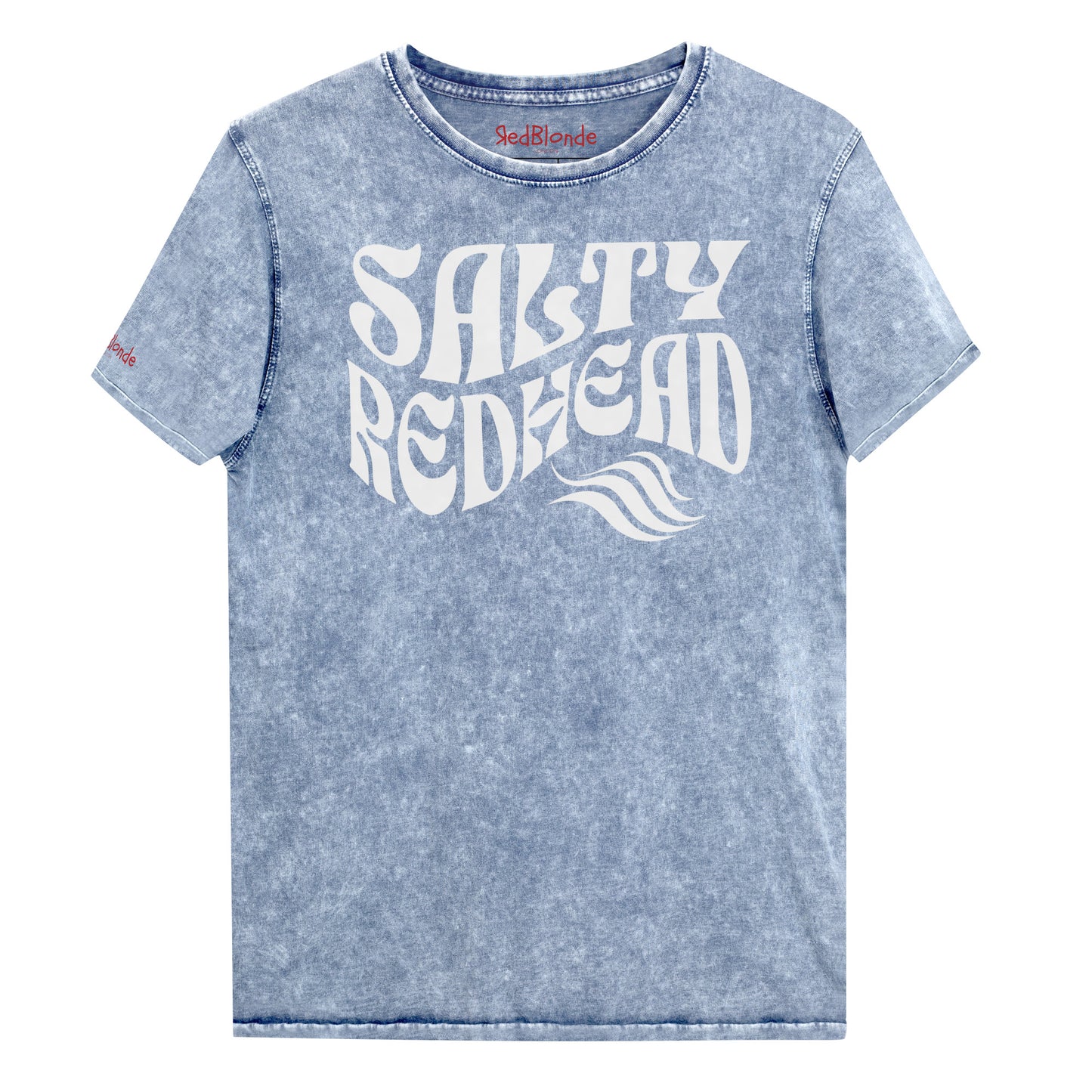 flatlay of a unisex relaxed fit denim-wash t-shirt with the words 'Salty redhead' in retro 70s vibe text in white. Branded Redblonde on inside neck and right shoulder in red