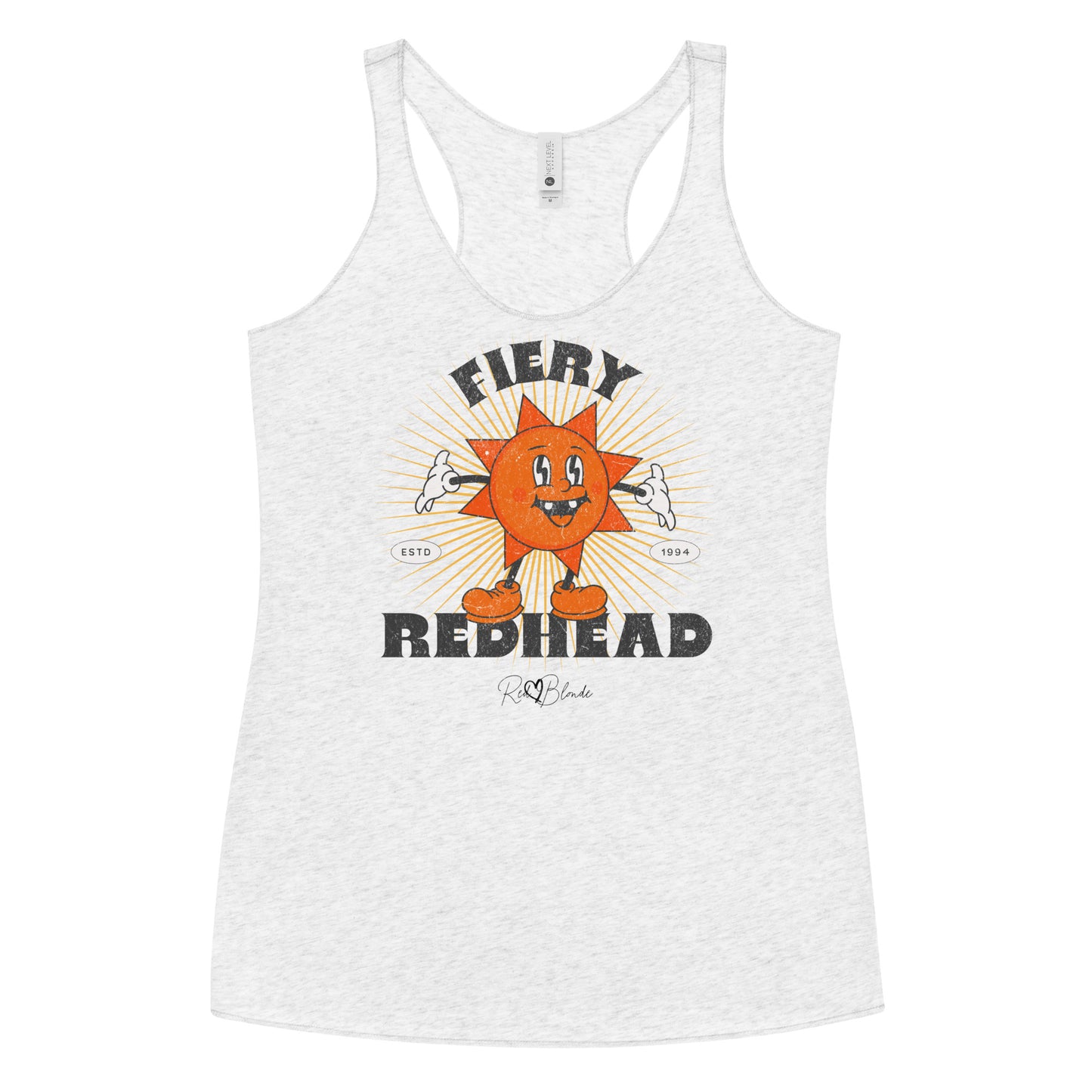 White women’s racerback tank with a bold retro graphic of a smiling orange cartoon sun character, surrounded by radiant sunbeams. The text reads ‘Fiery Redhead’ in distressed black Belzebuth lettering with small details including ‘ESTD 1994’ and the RedBlonde signature logo beneath."