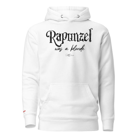 white unisex pullover hoodie with kangaroo pocket and adjustable drawstrings. The front features distressed black lettering that reads “Rapunzel was a blonde” in a mix of gothic and script fonts, with the RedBlonde signature logo beneath. Branded RedBlonde on inside neck and right sleeve
