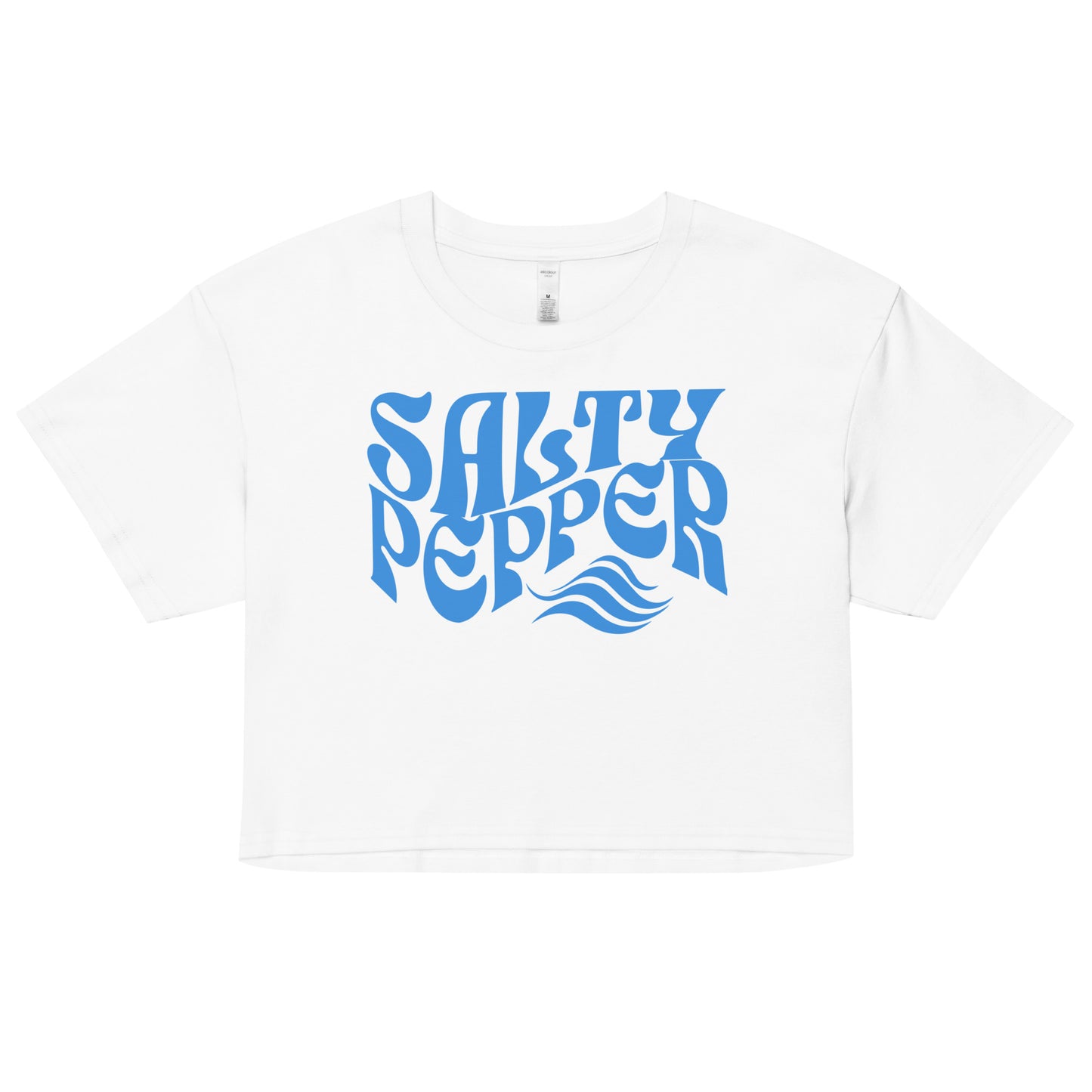 Flatlay of a white loose women's crop top t-shirt with the words ‘Salty Pepper’ in blue retro wavy 70s font