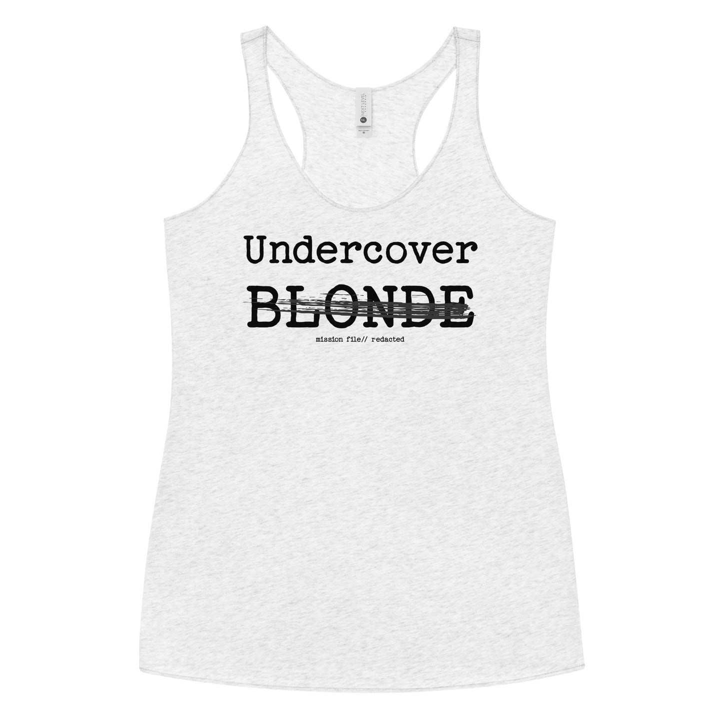 A white racerback tank featuring a bold black text reading “Undercover BLONDE” with “BLONDE” partially struck through by a horizontal black bar. Beneath it, smaller text says “mission file // redacted” along with a subtle RedBlonde logo. Branded RedBlonde London in red on the reverse