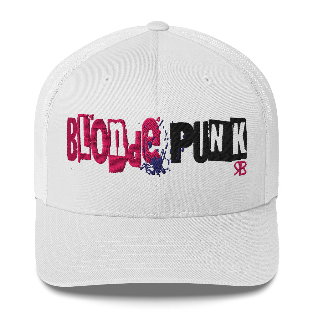 white trucker cap with 'Blonde Punk' in irregular printing block style caps and lowercase. Blonde is written in bright pink and Punk in black lettering. Branded RB in red