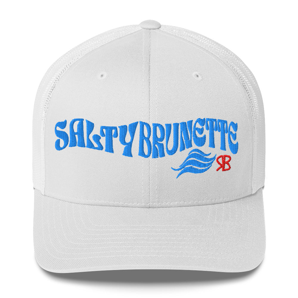white trucker cap with 'Salty Brunette' in blue Solino display font. Branded RB in red