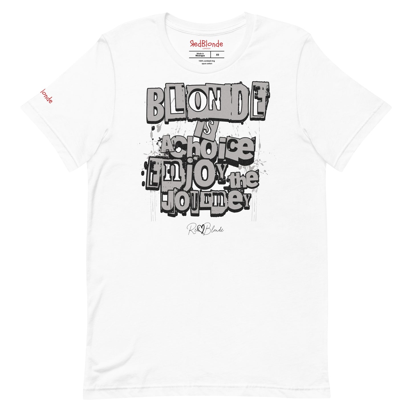 A white unisex T-shirt with a classic crew neckline and short sleeves. The front displays a bold, graffiti-style text design in black, white, and gray. The words read: “BLONDE is a choice, ENJOY the JOURNEY” with varied fonts and a layered street-art effect. The RedBlonde brand name is subtly printed below in a handwritten script. Branded RedBlonde london in red on inside neck and right sleeve