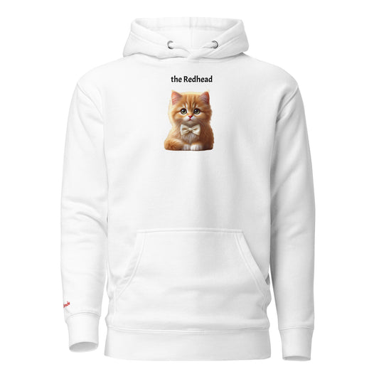 Flatlay of white relaxed fit unisex hoodie with a cute graphic of a redhead kitten wearing a bow-tie and the words 'the Redhead' linking to Red hair. Branded RedBlonde in red on inside neck and right cuff