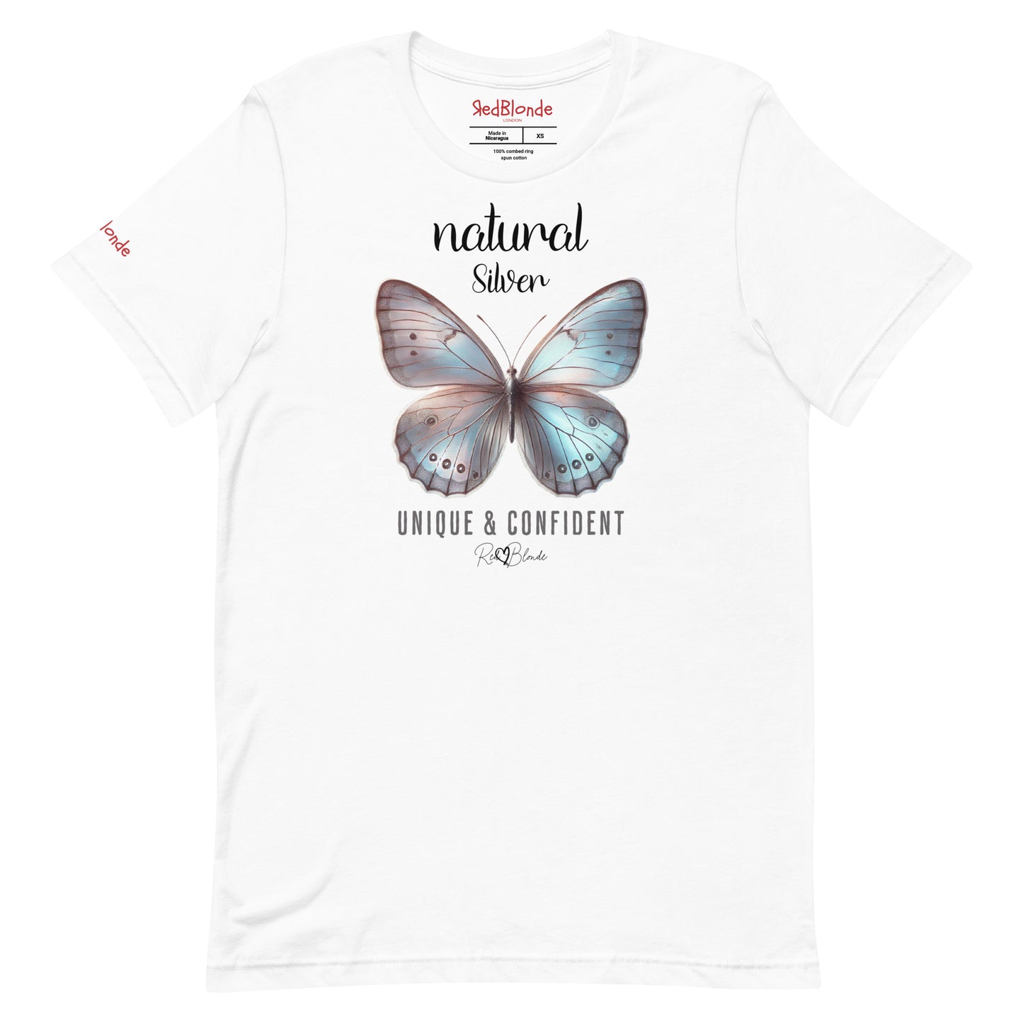 Flatylay of a white unisex relaxed fit t-shirt with the words natural Silver in arionna font above a graphic of a silver butterfly with 'UNIQUE & CONFIDENT' below in adventurer 06 font signed off by RedBlonde. Branded RedBlonde London on inside neck and right sleeve