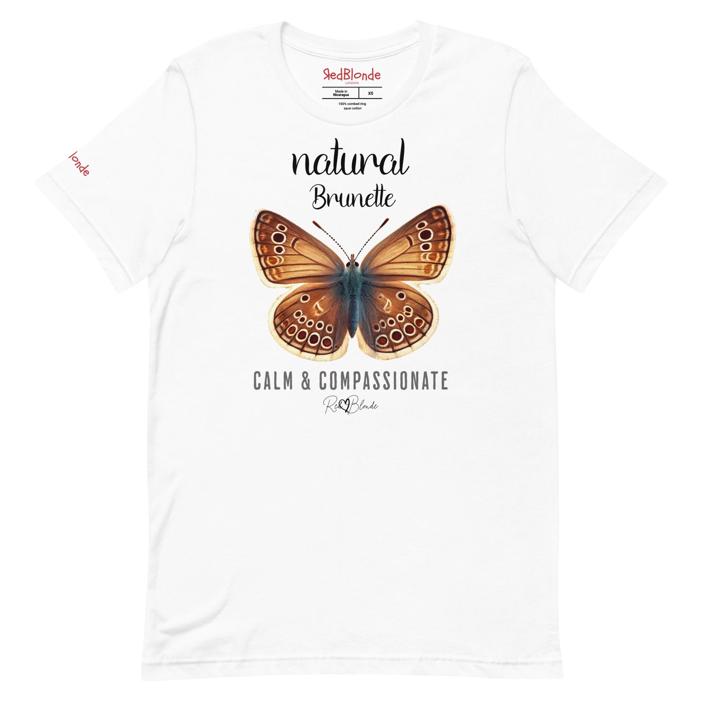 flatlay of white unisex relaxed fit t-shirt with the words natural brunette in arionna font above a graphic of a brunette brown butterfly with 'CALM & COMPASSIONATE' below in adventurer 06 font signed off RedBlonde. Branded RedBlonde London on inside neck and right sleeve