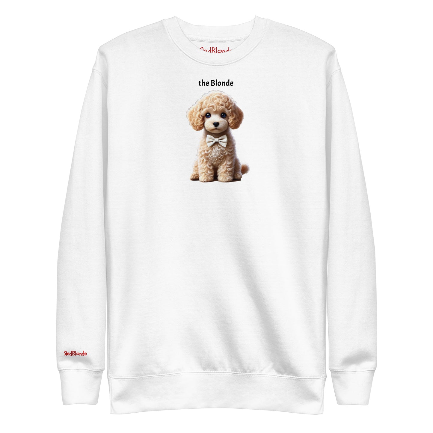 Flatlay of white relaxed fit unisex sweatshirt with a cute graphic of a Blonde Puppy wearing a bow-tie and the words 'the Blonde' linking to Blonde hair. Branded RedBlonde in red on inside neck and right cuff