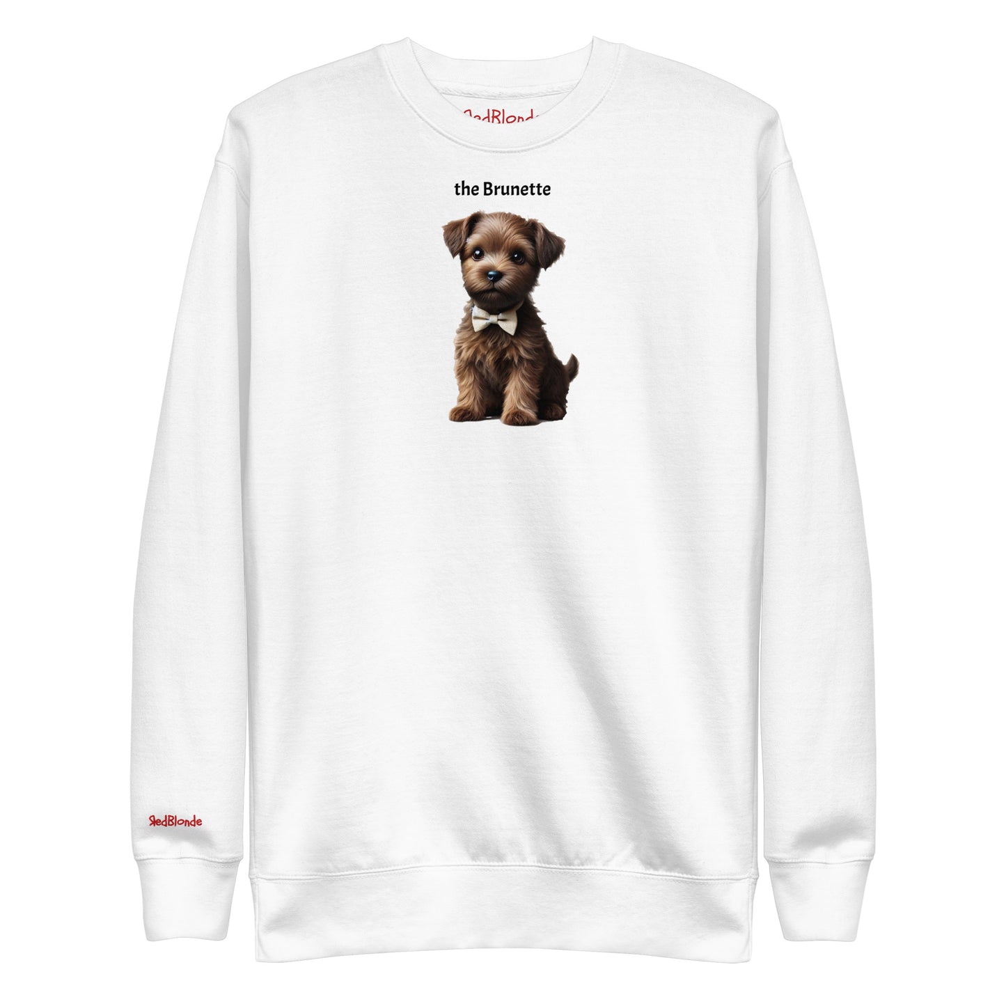 Flatlay of white unisex sweatshirt with a cute graphic of a Brunette puppy wearing a bow-tie and the words 'the Brunette' linking to Brunette hair. Branded RedBlonde in red on inside neck and right cuff