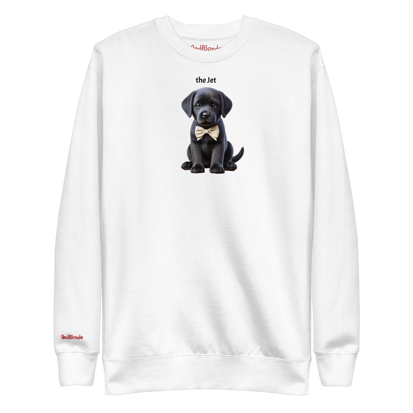 Flatlay of white relaxed fit unisex sweatshirt with a cute graphic of a Jet black puppy wearing a bow-tie and the words 'the Jet' linking to Black hair. Branded RedBlonde in red on inside neck and right cuff