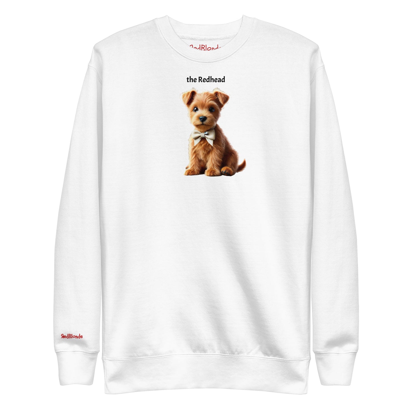 Flatlay of white relaxed fit unisex sweatshirt with a cute graphic of a Redhead Puppy wearing a bow-tie and the words 'the Redhead' linking to Red hair. Branded RedBlonde in red on inside neck and right cuff