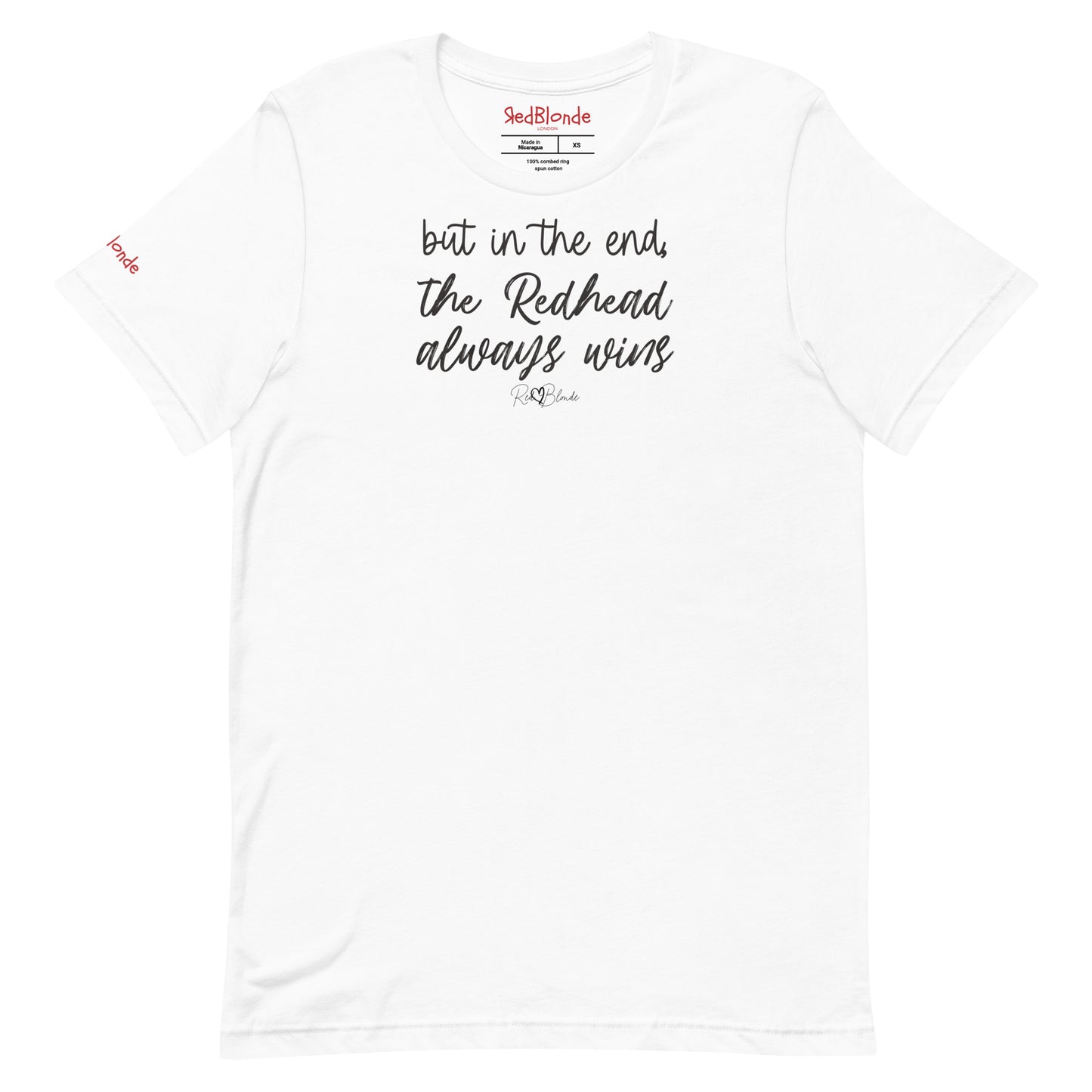 A white unisex t-shirt featuring the handwritten-style slogan “but in the end, the Redhead always wins” in Hillbear font in dark gray text across the chest, signed off RedBlonde. Branded “RedBlonde London on inside the collar and on the right sleeve