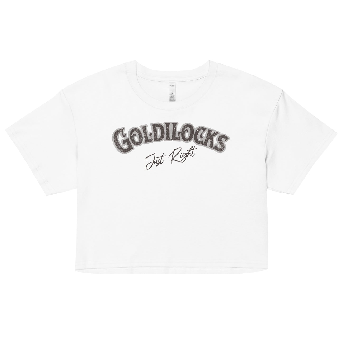 white women’s crop top with the text “Goldilocks Just Right” in black and white Signmaster Pro textured font, designed in a bold retro style. Branded RedBlonde on the reverse