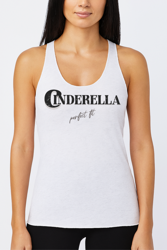 woman with jet black hair wears a White women’s racerback tank top featuring black merger text that reads “Cinderella” with a decorative crescent moon incorporated into the letter C, and the phrase “perfect fit” written underneath in an elegant cursive script.