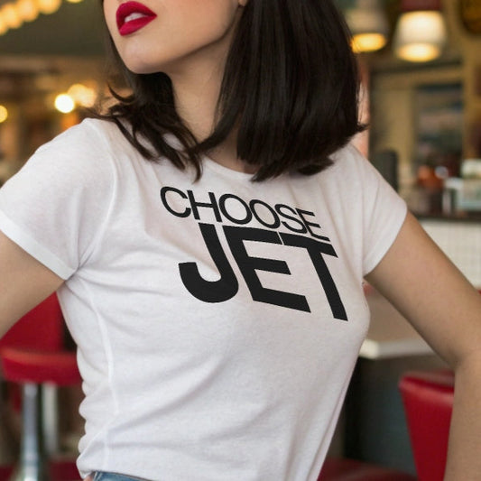 woman with jet black hair wears white relaxed fit graphic t-shirt with “Choose Jet” in black helvetica now font emblazoned on the front. Branded RedBlonde on the inside neck and right shoulder