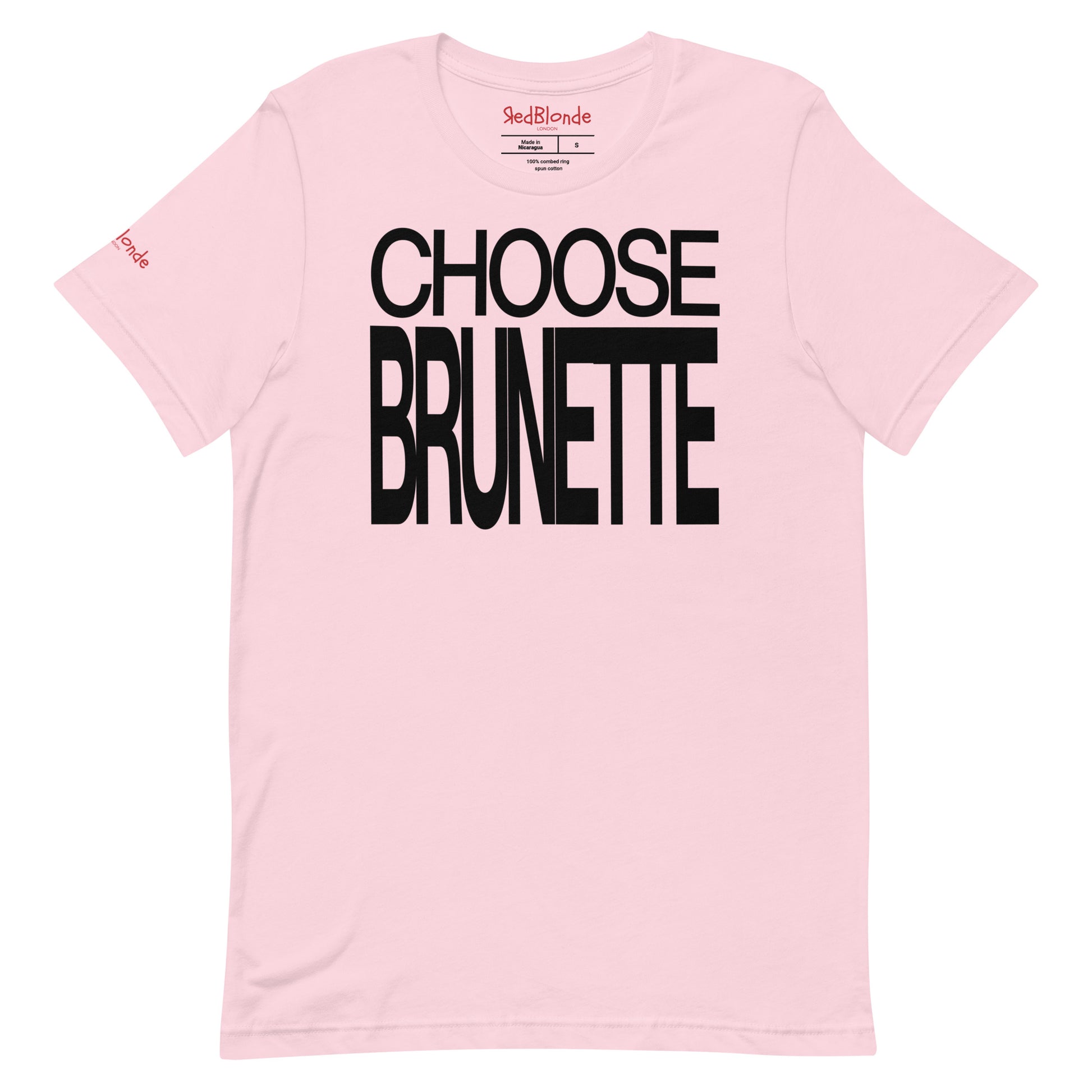 Flatlay of an 80s inspired unisex pale pink relaxed fit graphic t-shirt with “Choose Brunette”  in large caps written in black. Branded RedBlonde on the inside neck and right shoulder in red