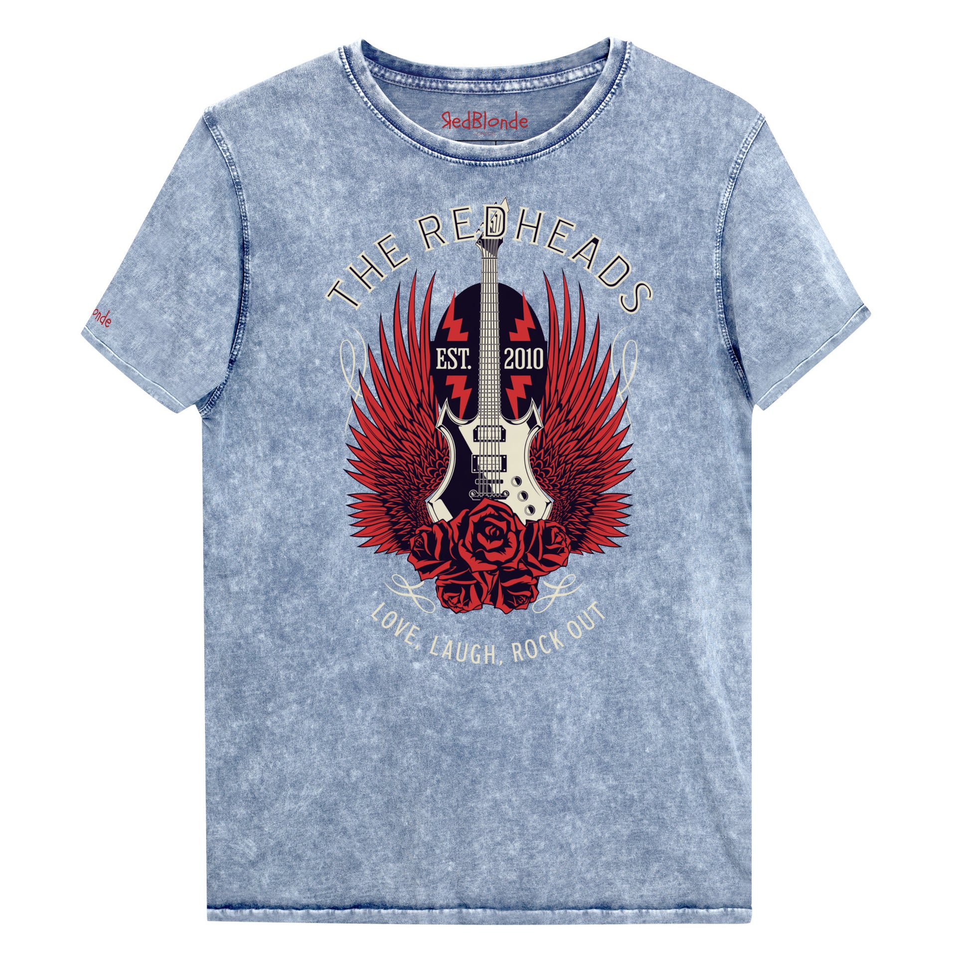 A flatlay of a blue denim wash unisex t-shirt with a graphic of a black & white guitar with red bird wings emerging from the side. The graphic features ‘THE REDHEADS' in Brookfield font in a semicircle above the guitar, while ‘Love, laugh, rock out’ is underneath. Branded RedBlonde London in inside neck and right sleeve