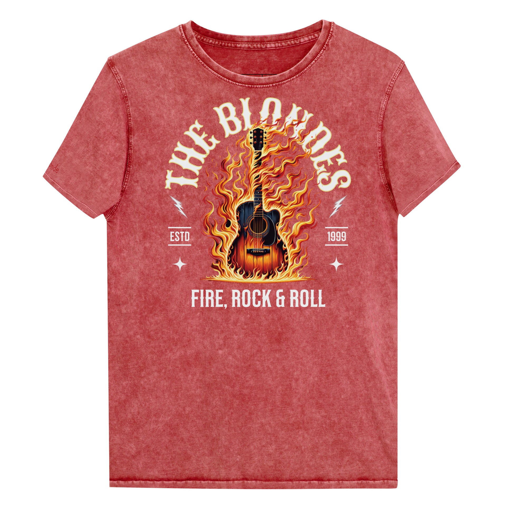 A garnet red denim wash unisex t-shirt with a  graphic of a wooden guitar on fire with ‘THE BLONDES’ in Sancreek font above the burning guitar and ‘FIRE, ROCK & ROLL' underneath. Branded RedBlonde London in inside neck and right sleeve.